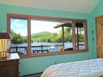 Queen bedroom and views from bed of the lake and Bald Mountain
